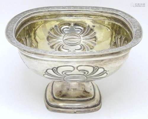 A Russian silver pedestal bowl with embossed floral motifs a...