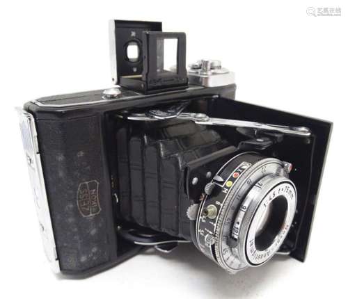A mid 20thC Zeiss Ikonta 521, 6x4.5mm film camera, in leathe...