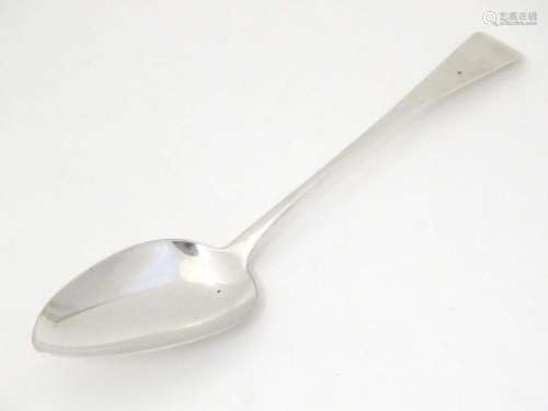A Geo III silver Old English pattern table spoon, hallmarked...