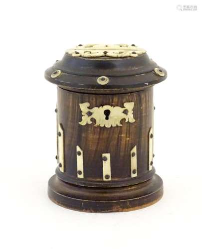 A 19thC treen money box with applied bone mounts. Approx. 4 ...