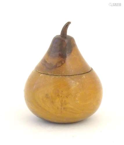A 20thC treen pot and cover modelled as a pear. Approx. 4 3/...