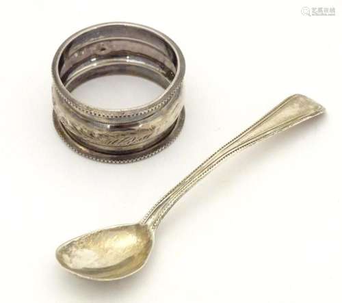 A silver napkin ring hallmarked Birmingham 1900, maker Henry...