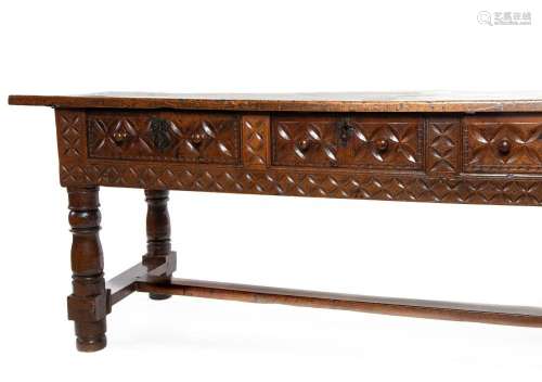 An outstanding and large carved walnut stretcher table,Spani...