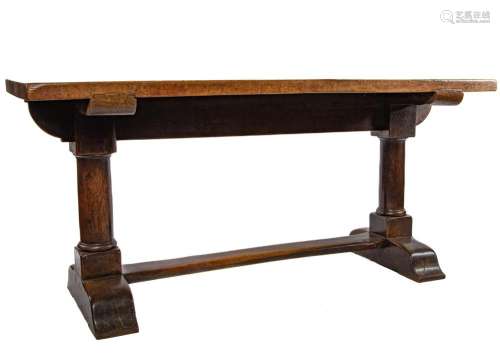 A classic Tuscan walnut trestle-table of great colour and si...