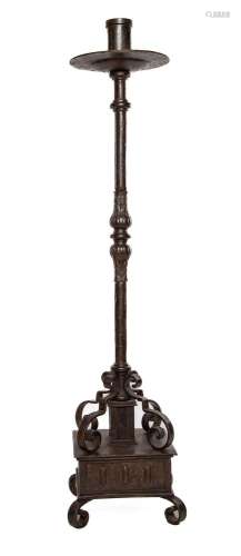 A tall square section wrought iron floor candle-stand,Spanis...