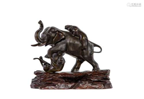 A well cast Japanese bronze of an elephant with two tigers,M...