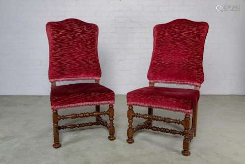 A set of four of Louis XIV turned walnut fully upholstered c...