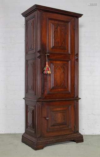 A rare Piedmontese walnut two-door narrow upright cupboard, ...