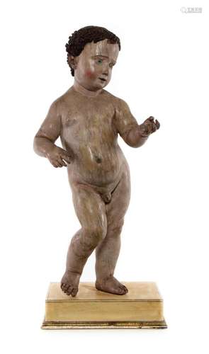 A very good polychrome painted and gesso figure of a cherub ...