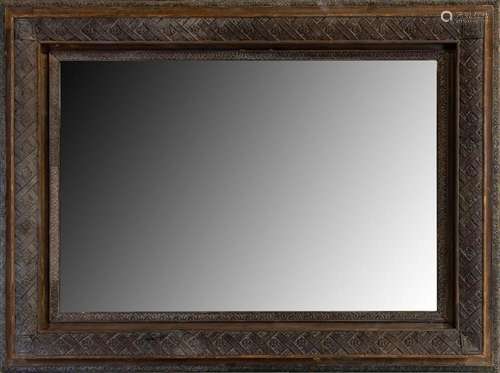 A large and finely carved walnut rectangular wall mirror, It...