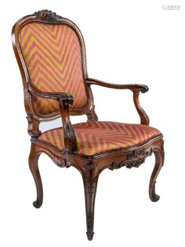 An elegant carved walnut armchair,Italian circa 1740