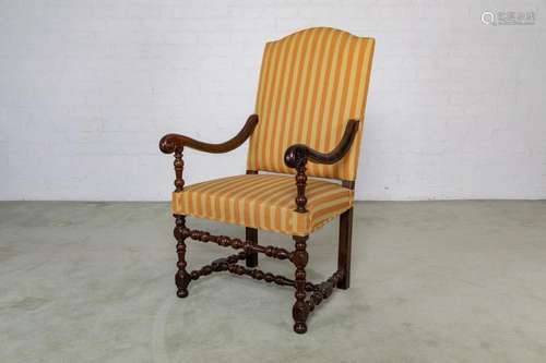 A large Louis XIV period armchair, in yellow striped fabric ...