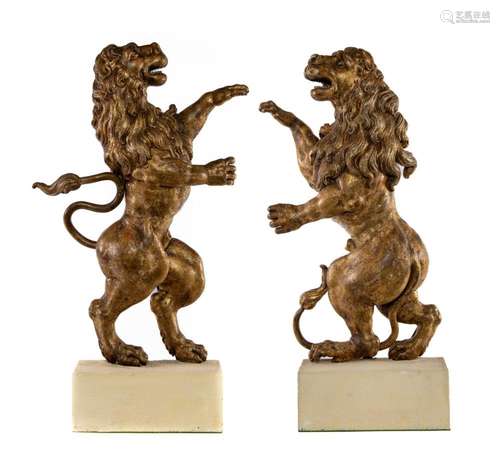 A pair of fabulous carved and giltwood rampant lions, Italia...