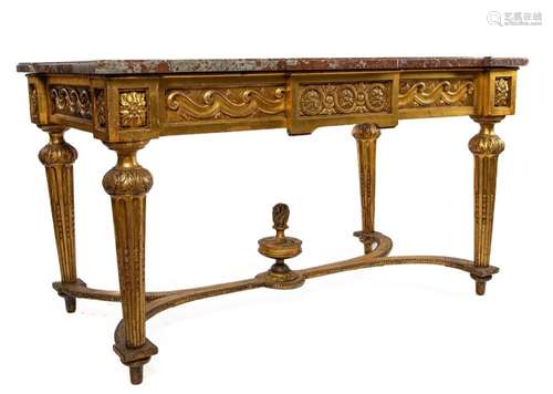 A very handsome and well-carved giltwood rouge marble top ce...