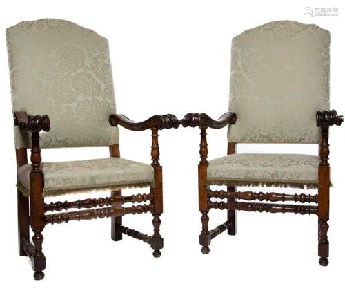 A pair of very impressive carved and turned walnut armchairs...