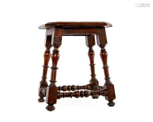 A turned walnut octagonal stool, Italian 18th century