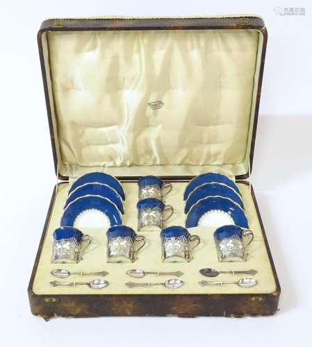 A cased set of six Art Deco Coalport coffee / tisane cups an...