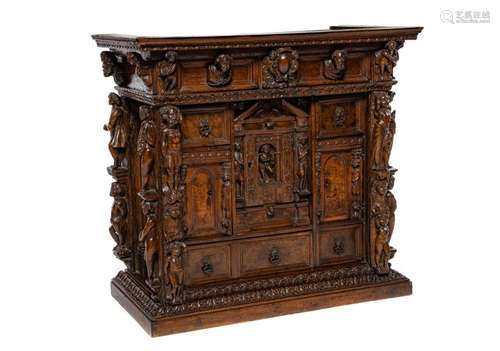 An exceptional carved walnut Bambocci table top cabinet, Ita...