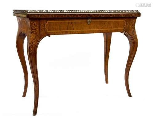 A fine quality marquetry and mellowed walnut writing table, ...