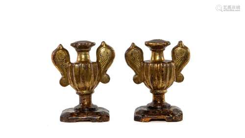 A pair of carved giltwood urns, Italian mid 18th century