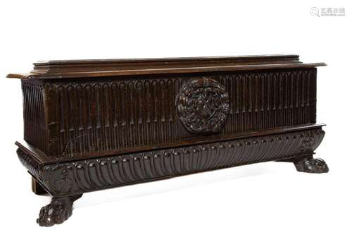 A fine carved dark walnut cassone, Italian circa 1640