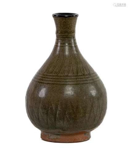 A Sawankhalok celadon glazed stoneware vase,Thai 15th centur...