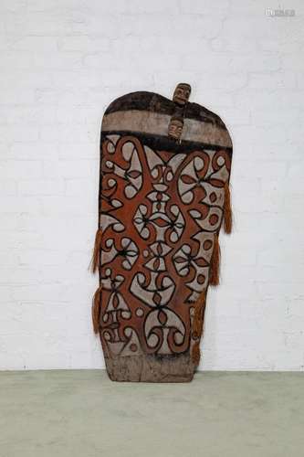 A large wide Asmat war shield,Papua New Guinea,20th century