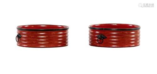 A fine pair of Regency red lacquer and copper rimmed circula...