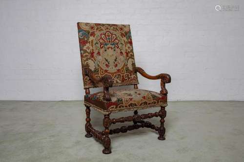 A Louis XIV walnut and tapestry armchair, Flemish circa 1680