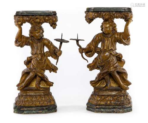 A very rare pair of polychrome painted and gilt-gesso candle...