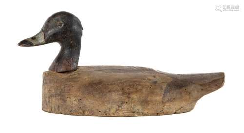 An early carved wood and painted decoy duck, French 19th cen...