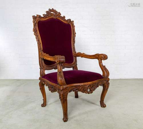 A large and Impressive carved walnut high back armchair, Ita...