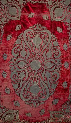 A sumptous gold-metallic thread embroidered red velvet panel...