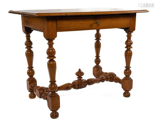 A turned walnut rectangular writing table, French circa 1680