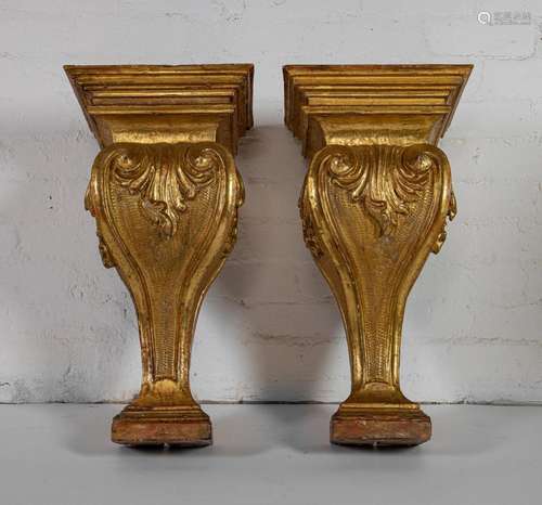 A fine pair of large giltwood and gesso cartouche shaped wal...