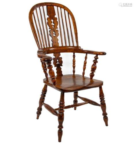 A classic yew-wood and elm Windsor armchair, English mid 19t...