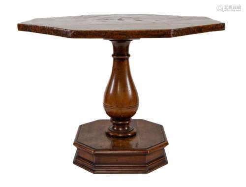 A walnut octagonal top centre table with baluster column, It...