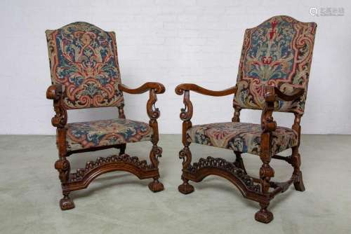A rare pair of William and Mary beech and tapestry armchairs...
