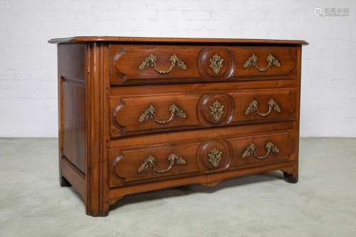 A Louis XV walnut commode of three long drawers, French circ...