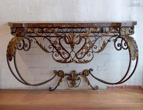 A wrought-iron and parcel-gilt console table with rouge marb...