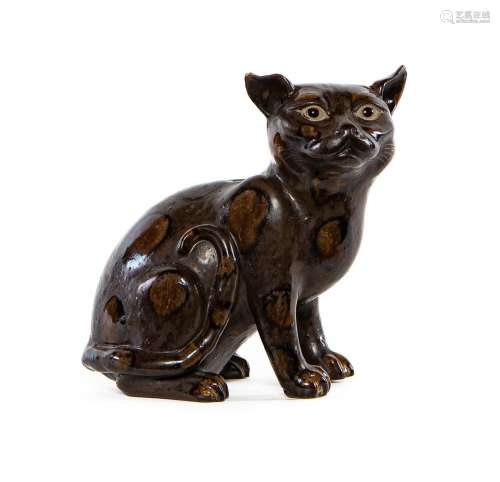 A Chinese tortioseshell glazed pottery seated black cat
