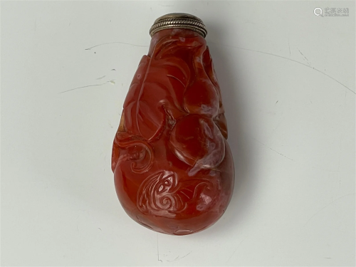 A Chinese Carved Red Agate Snuff Bottle