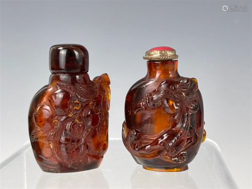 Two Chinese Detail Carved Amber Snuff Bottle