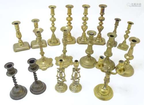 A quantity of 19thC and later cast brass candlesticks of var...