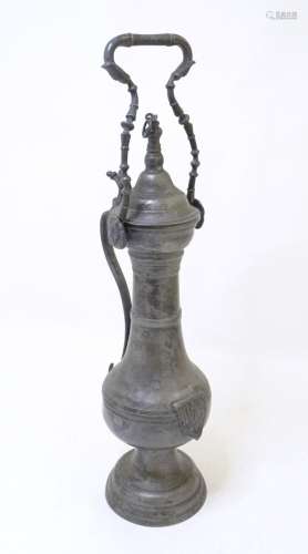 A Continental tall pewter pedestal stein / vessel with swing...