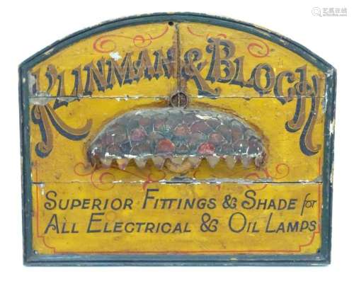 A 20thC painted wooden shop advertising sign for Runman &...