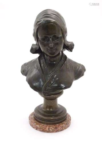 A 20thC Continental cast bronze bust depicting a young Dutch...