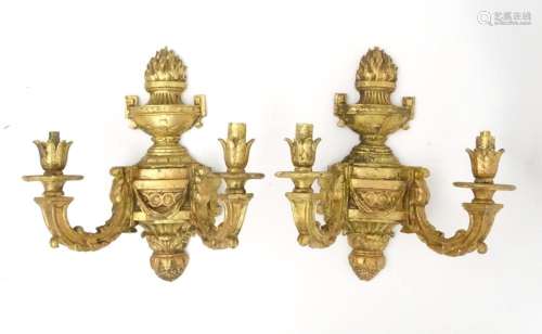 A pair of twin branch carved wood wall lights with gilt deco...