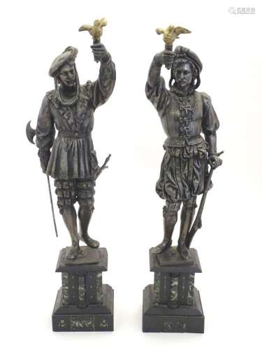 A pair early 20thC Continental cast metal figures depicting ...