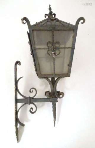 An early 20thC exterior lamp and wall bracket, of lantern fo...